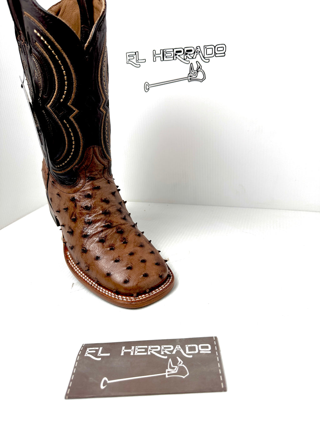 BOTAS EN PIEL DE AVESTRUZ SUELA CAFÉ HORMA 62